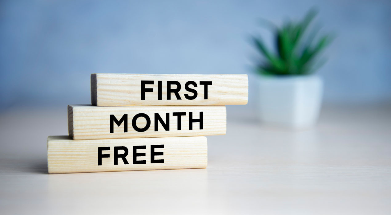 wooden blocks stacked together with words first month free